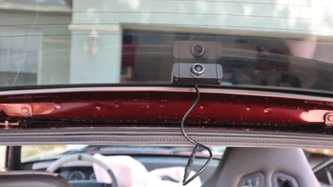 Car (general) dash cam shown in a real-world setting