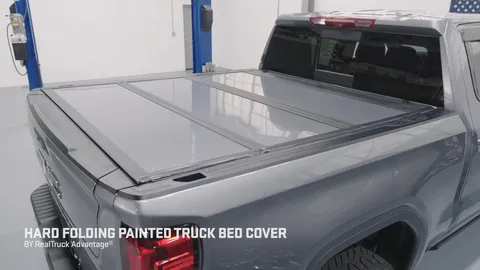 GMC Sierra tonneau cover shown in a real-world setting